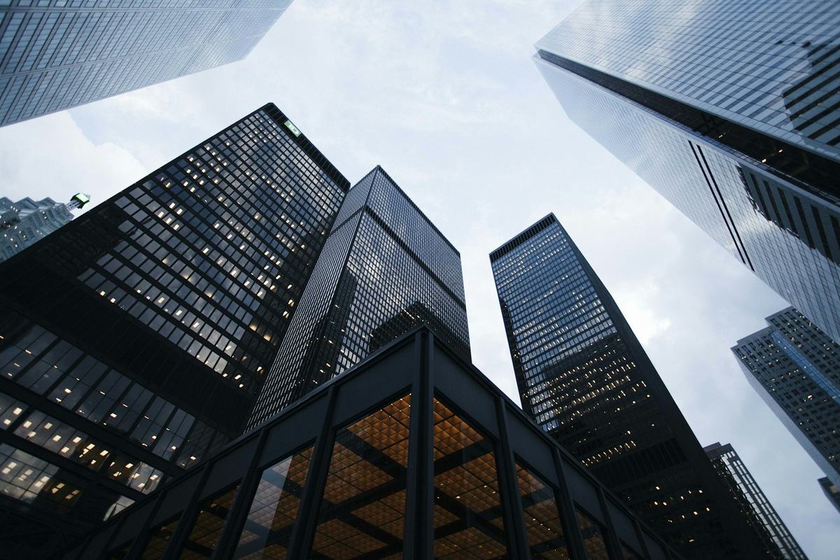 Commercial office towers seen from street level.